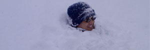 Justin buried in some snow in Colorado